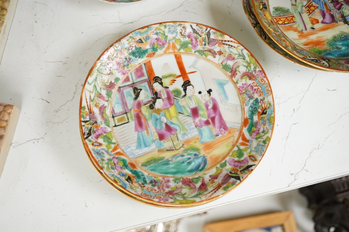 A collection of Chinese Canton figural plates, 19th century, together with an 18th century export famille rose saucer, largest 16cm (7)